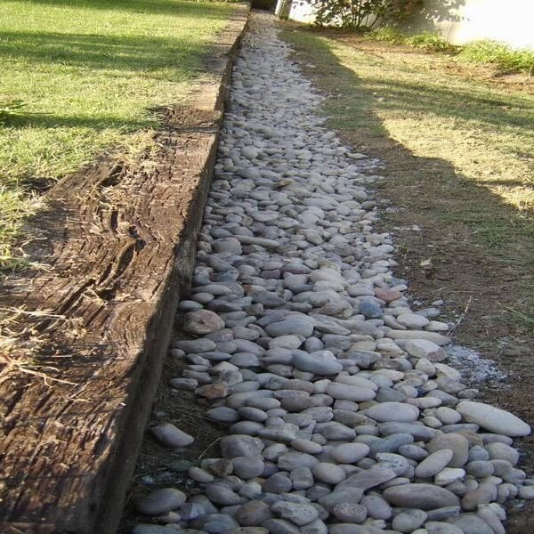 Can I mortar between the river stones? The stones are slightly embedded,  but I'm sure I did not do the install properly. I'd like to fill in a bit  and leave less
